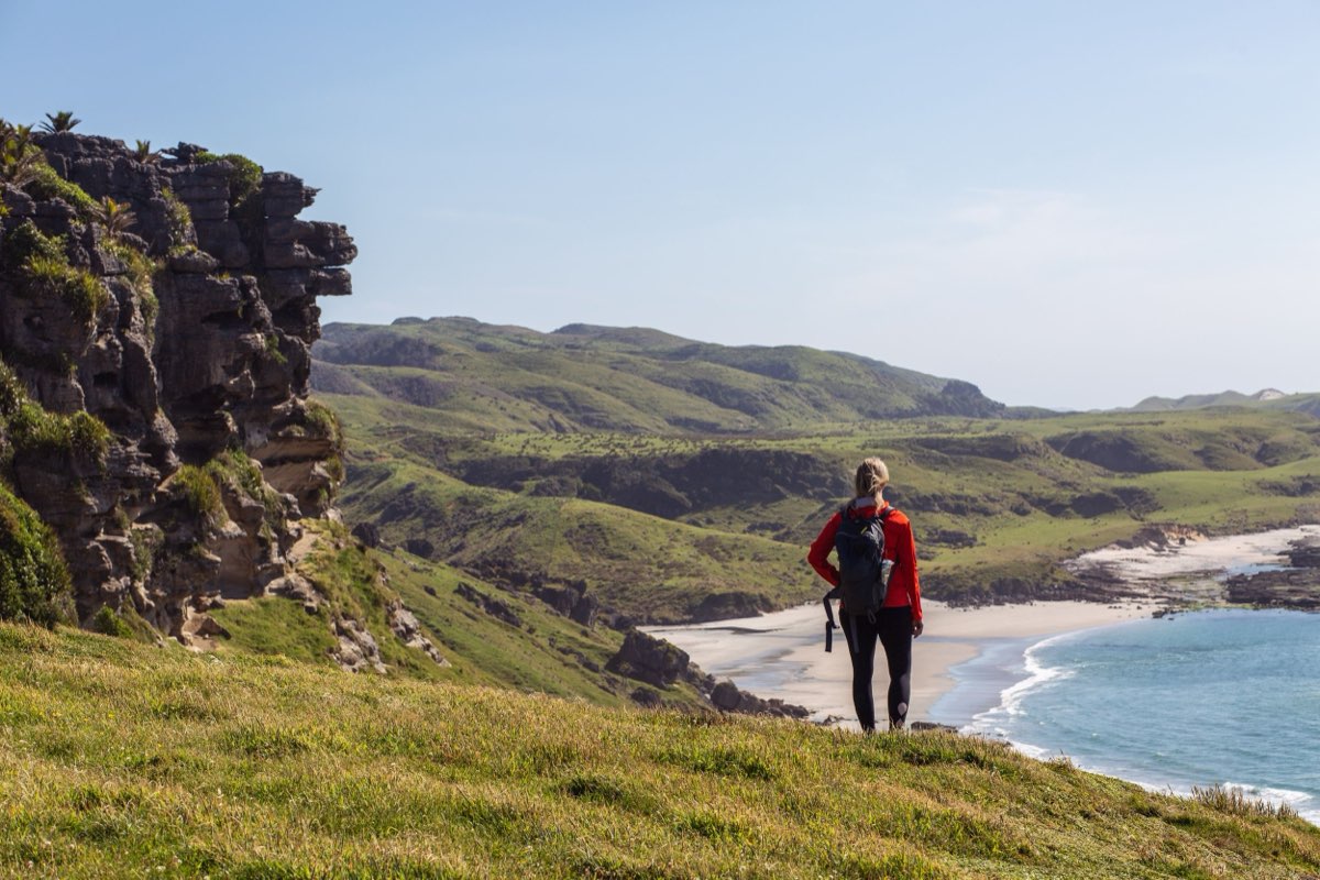 Jaimie on a cliff trail in Kahurangi