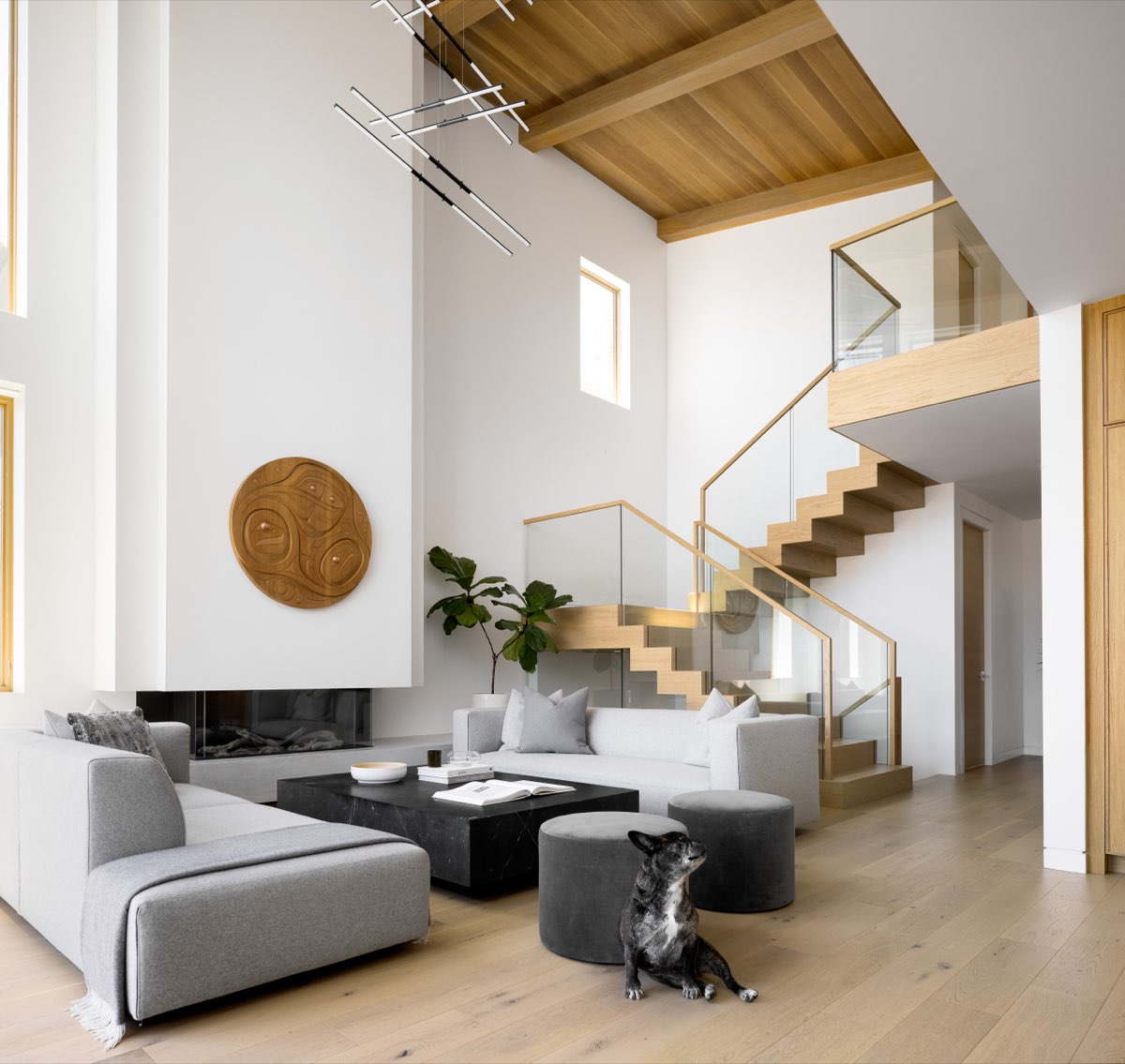 Curved sofa under a timber ceiling