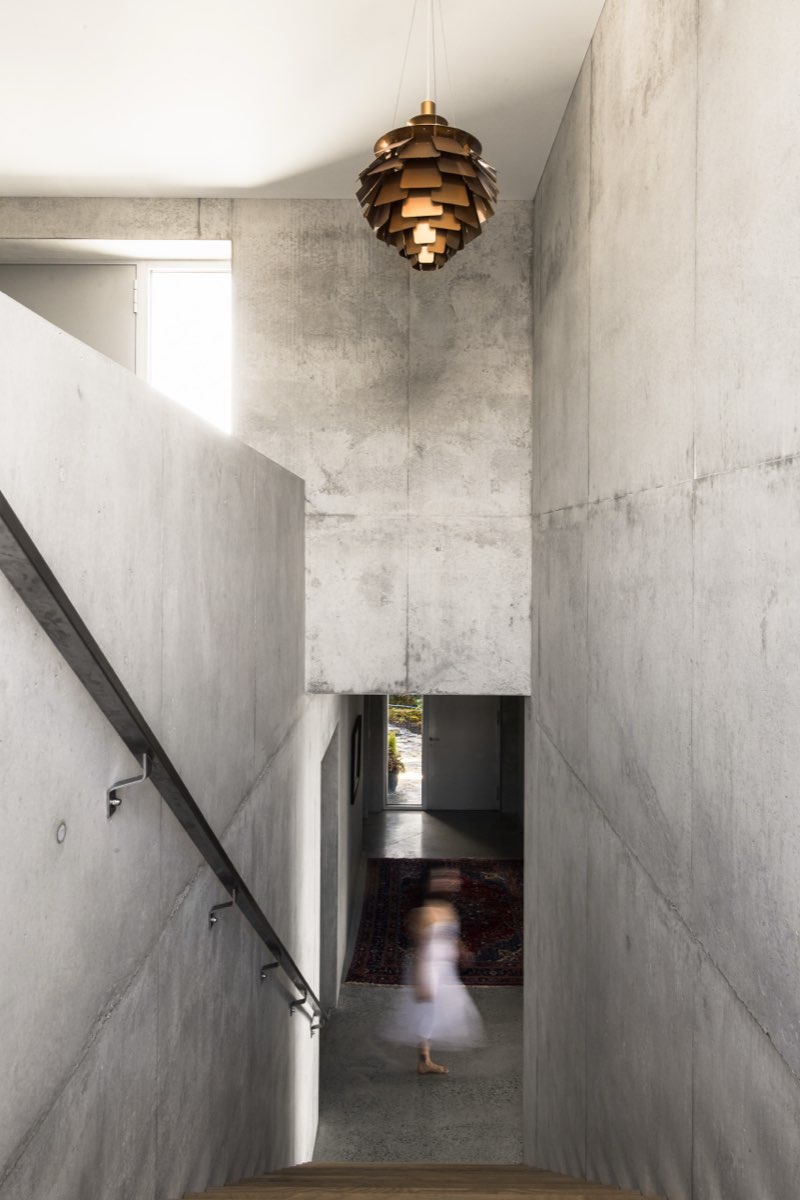 Plaster stairwell with a single pendant