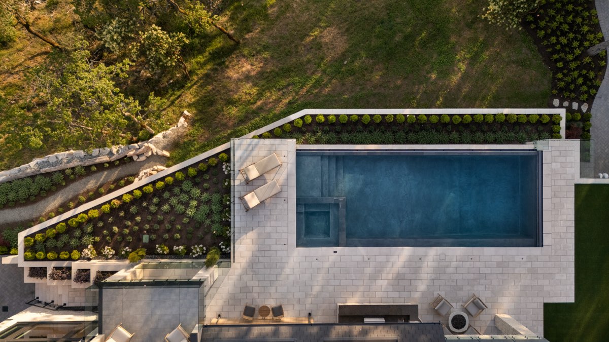 Aerial of a pool terrace and garden