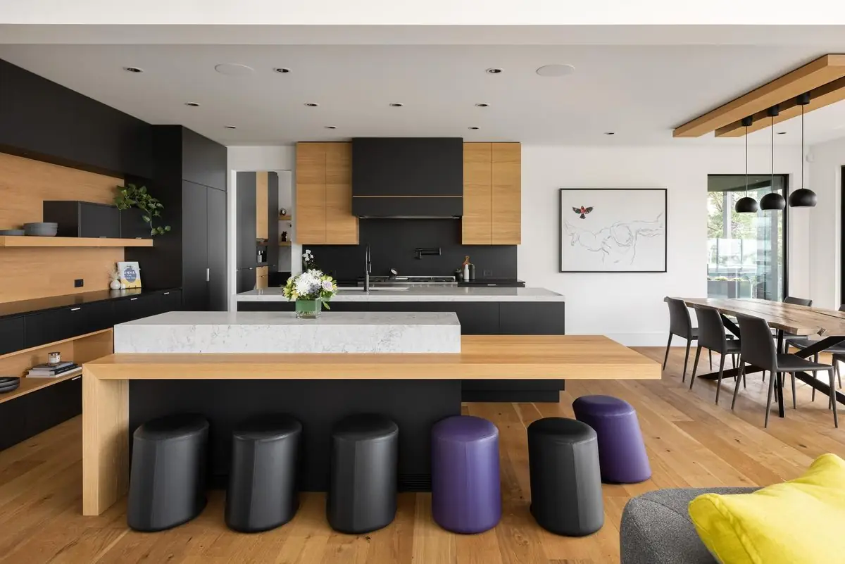 Kitchen island with walnut bar and marble