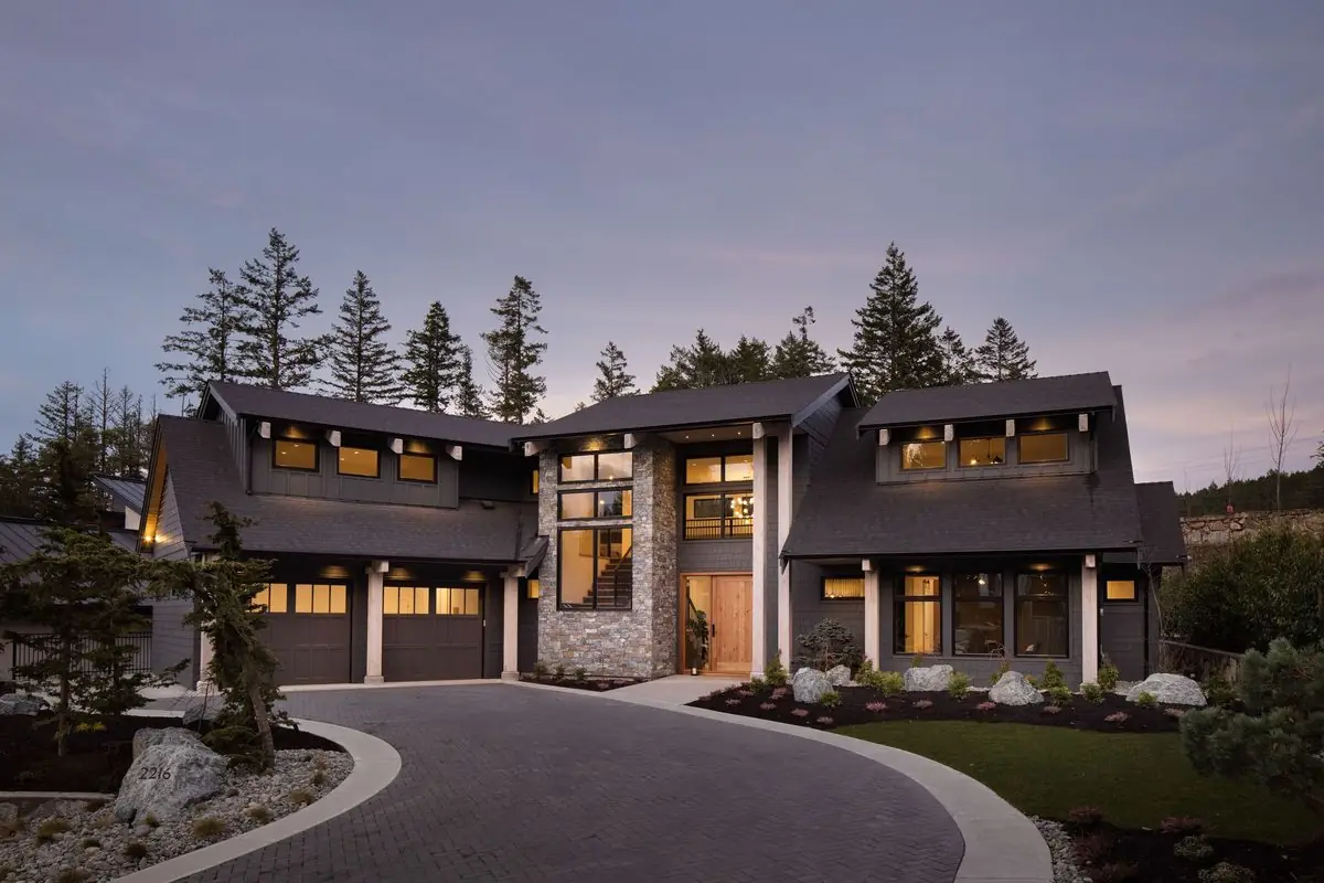 Modern home and driveway at dusk