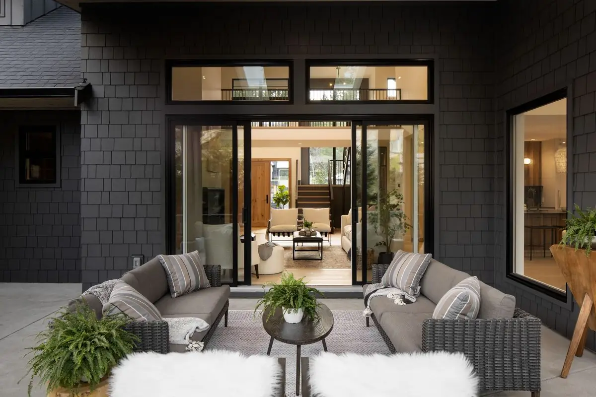 Covered outdoor living room at dusk