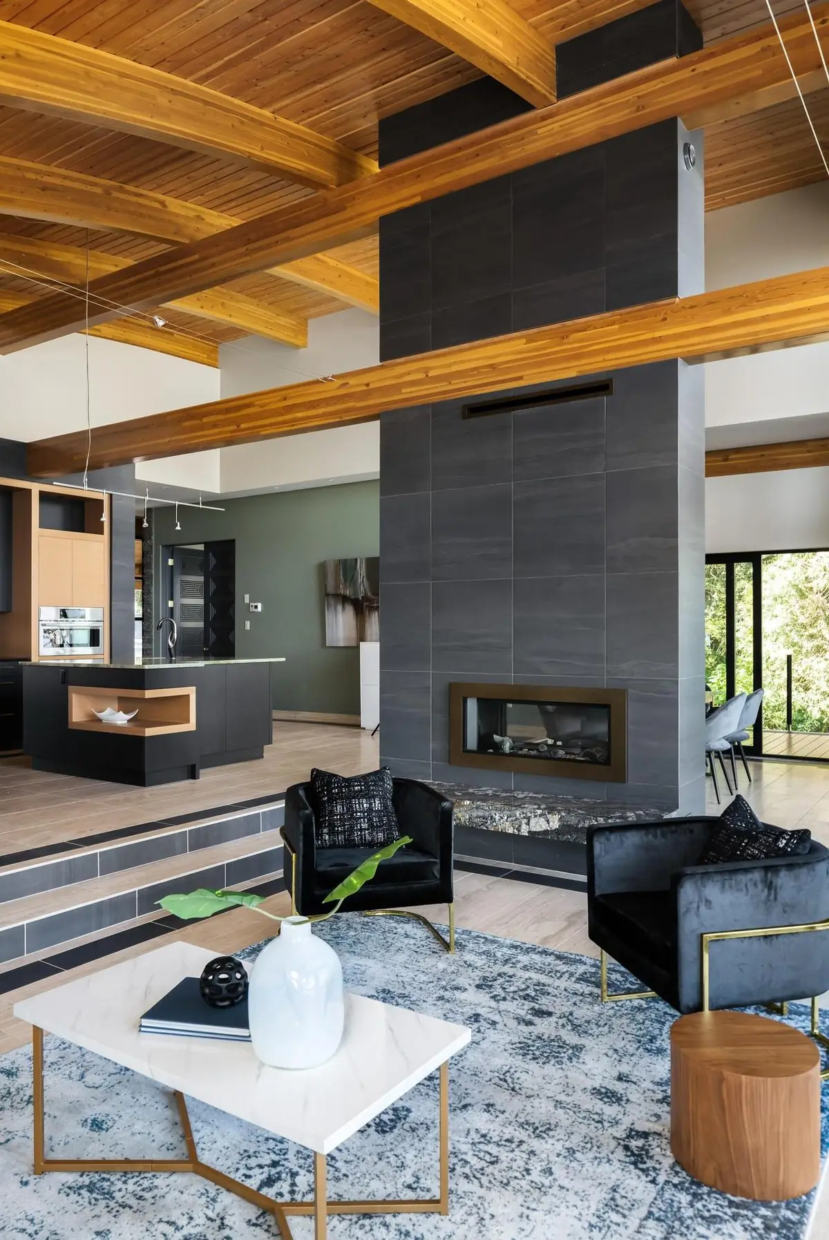 Living room with a fireplace wall and timber beams, portrait frame