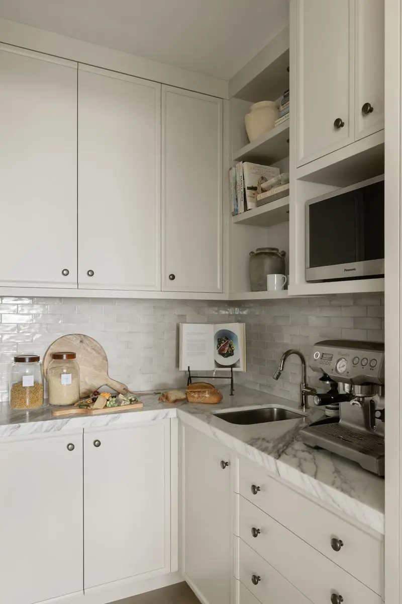 Coffee corner with open shelves and an espresso machine