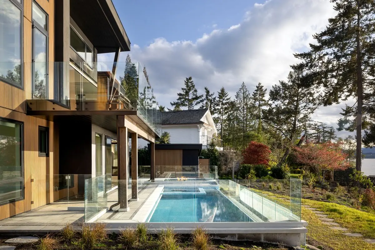 Pool and glass railing below the upper deck