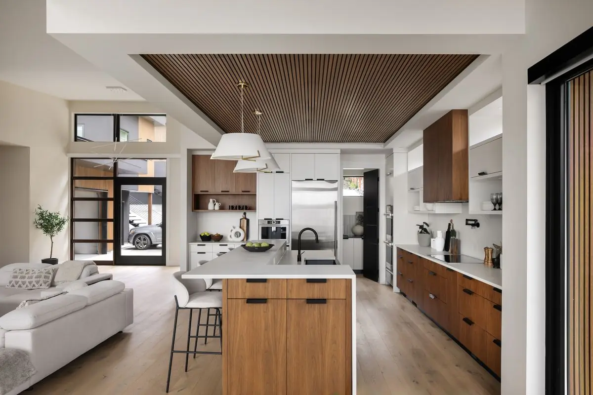 Kitchen under a timber ceiling