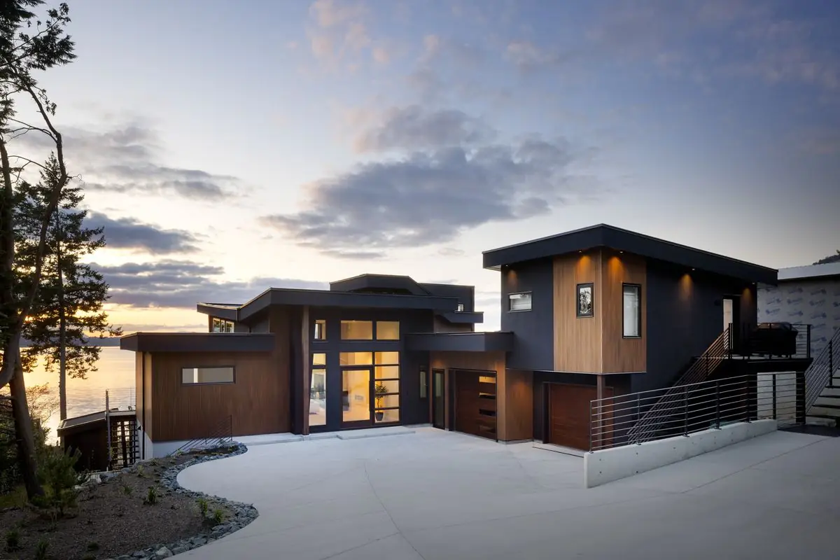 The house at dusk from the drive