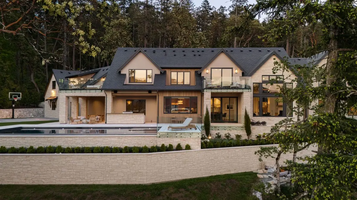 The house and the pool at dusk
