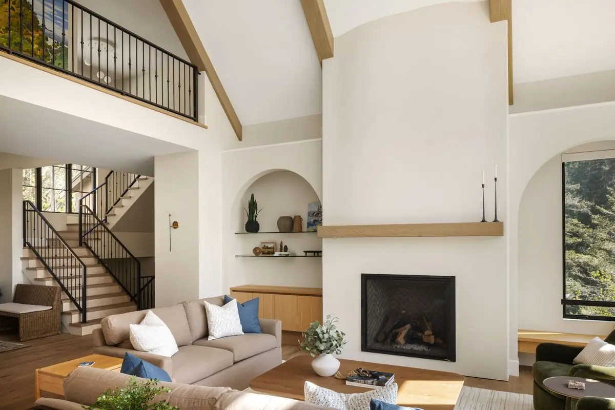 Living room, fireplace and open stair