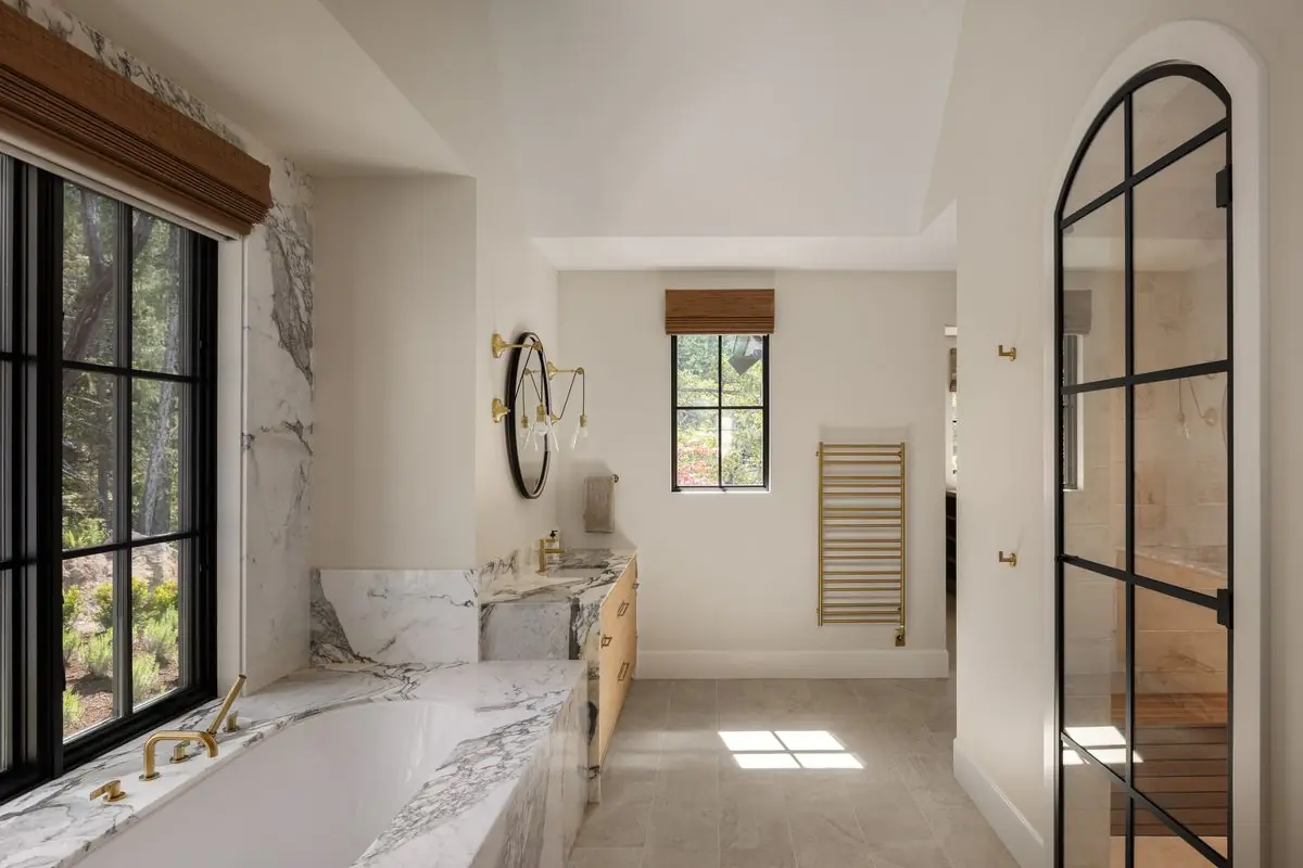 Bathroom with a steel-framed glass door